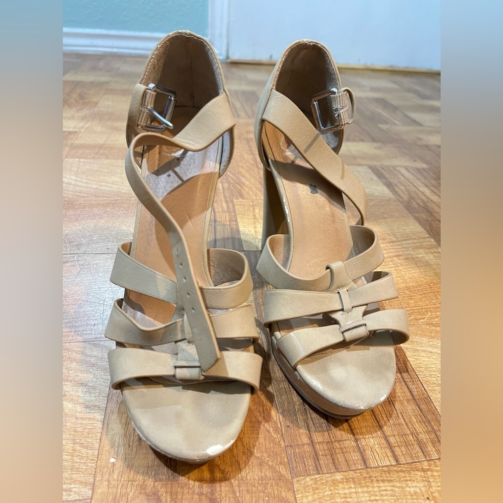 Beige high heels.